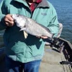 Paul fishing at Lake close to Village